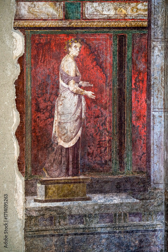 Ruins of Pompeii, Italy. Decoration detail. Fresco painting on the wall of Villa of the Mysteries.