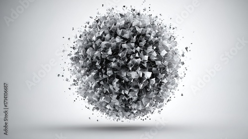 A sphere of fragmented, dark gray, geometric shapes explodes outward against a light gray background