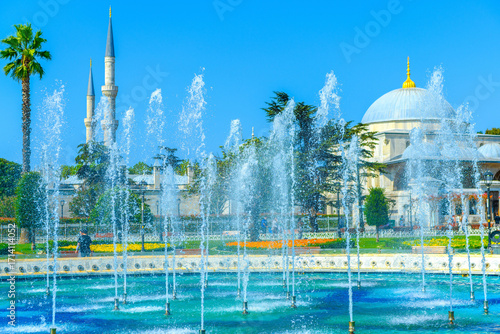 Fountain with water and splashes in Sultanahmet Square, Istanbul, near Hagia Sophia.