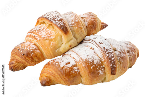 Freshly baked golden brown croissants sprinkled with powdered sugar on a white background, a delicious breakfast pastry