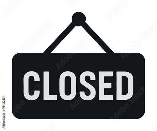 Black closed sign hanging on white background