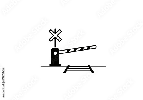 A black and white image of a railroad crossing