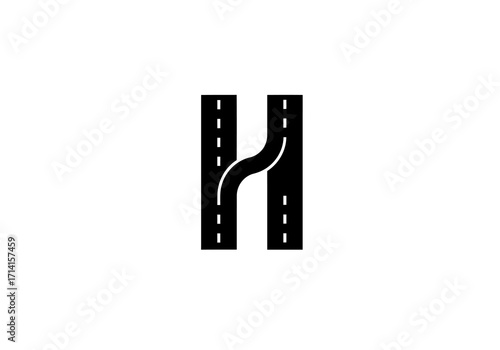 Black  white image displays a highways road branching from one road to another