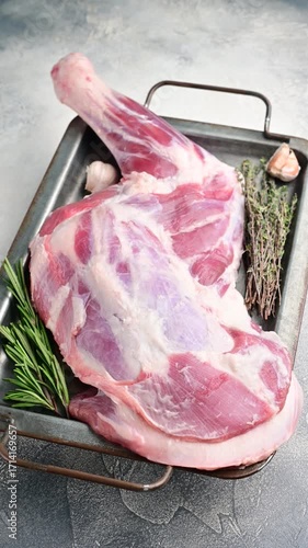 Fresh raw lamb shoulder, leg perfect for slow cooking or roasting to create a tender, flavorful meal.