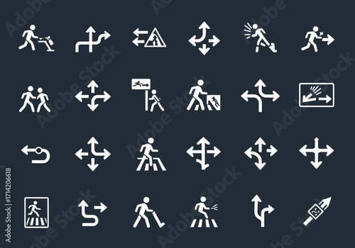 Array of white directional and pedestrian safety icons on a dark background