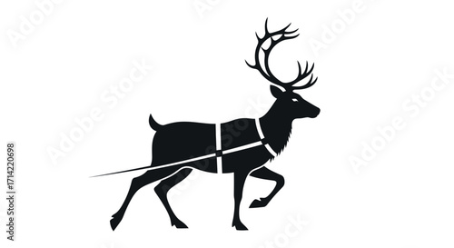 Silhouette of a reindeer with large antlers, harnessed for pulling, walking forward.