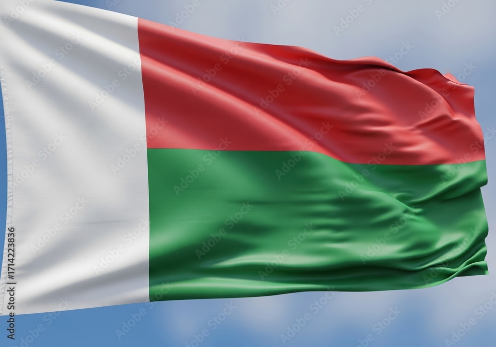 Obraz premium Flag of Madagascar waving in the blue sky