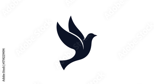 Silhouette of a flying dove bird in motion.