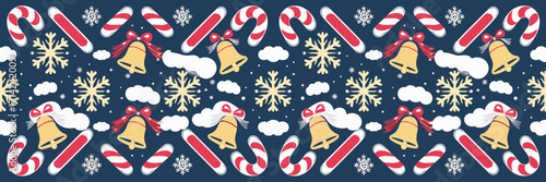 Holiday pattern with candy canes, snowflakes, and bells on deep blue sky with clouds