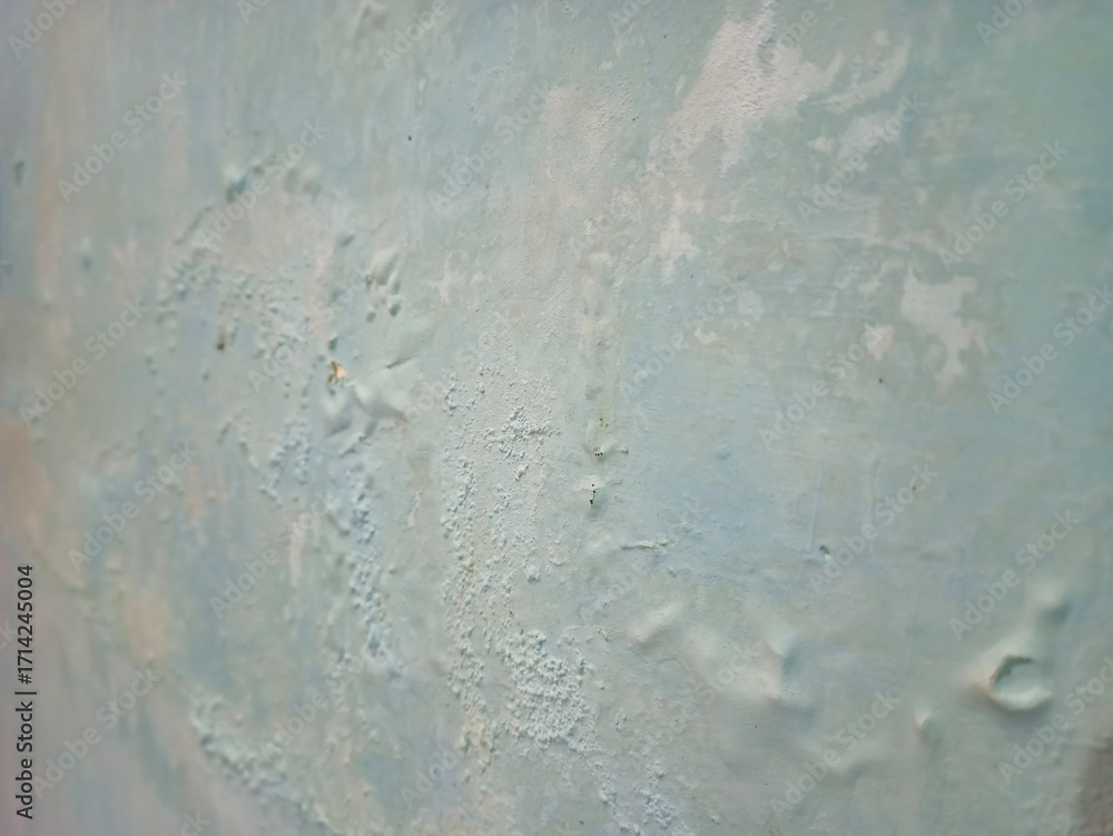 Obraz premium Damp and moldy wall. Peeling of paint and swelling of the wall from excessive moisture. Water is leaking out of the wall.