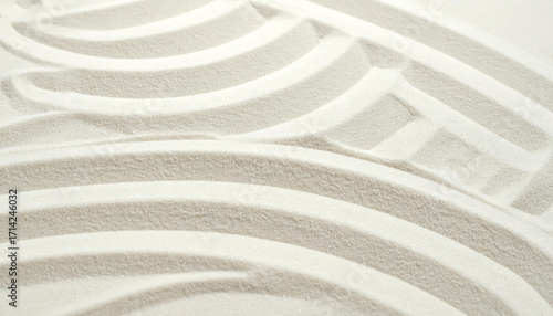 Abstract white sand patterns creating a calming and meditative zen garden texture, perfect for backgrounds