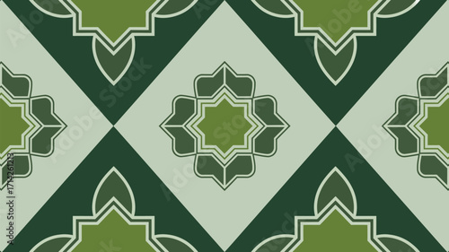 A seamless pattern of geometric shapes in shades of green and white creating a tile like appearance