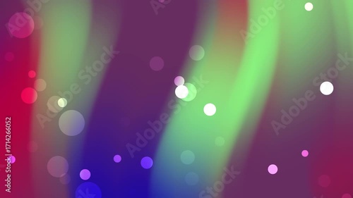 Abstract background with blurry streaks of green, red, purple, and bokeh. Ideal for vibrant and dynamic designs or festive themes.