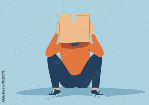 Depressed man squatting with cardboard box on head hiding face in minimalistic flat style conveying shame failure and anxiety concept of social isolation or personal struggle