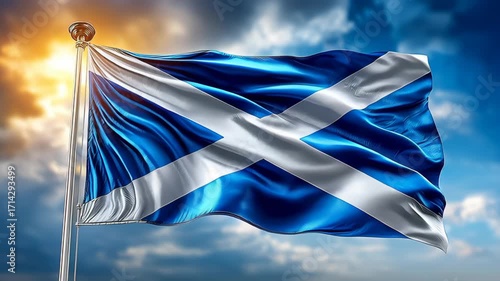A Scottish flag waving against a bright blue sky with clouds. The flag features a blue field with a white saltire cross.