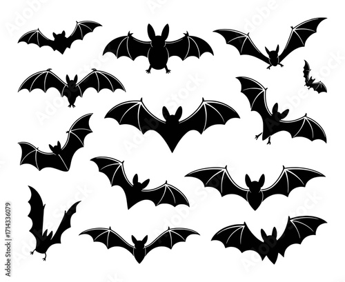 Collection of Black Bat Silhouettes Flying Against a White Background