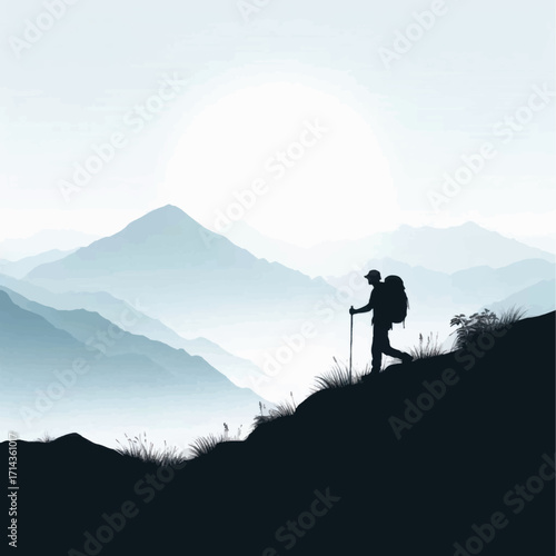 Silhouette of a lone hiker with a backpack and walking stick.