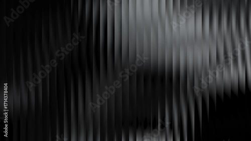 Sleek and luxurious dark abstract background with a subtle shimmer on black and grey vertical lines. A sophisticated and elegant seamless loop animation for premium branding or cinematic titles in 4K.