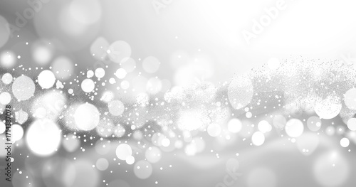 Abstract grayscale image featuring a soft, flowing wave of out-of-focus light orbs and particles, creating a dreamy, ethereal effect