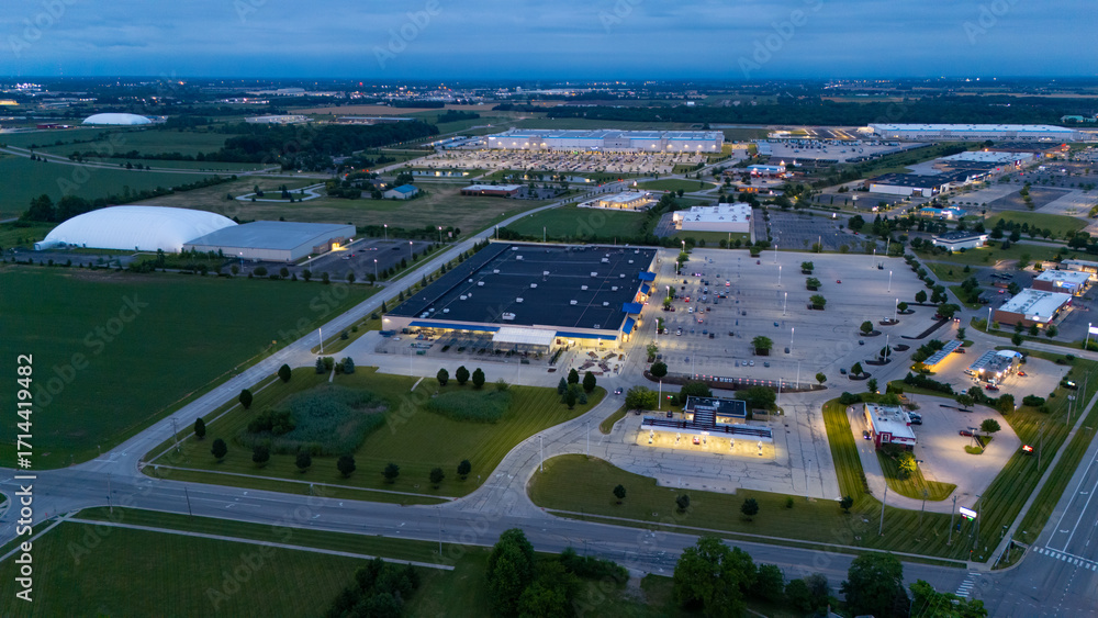 Fototapeta premium A prominent, large building with solar panels covering its roof stands 