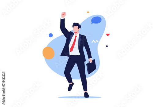 Successful businessman celebrating victory with raised fist and briefcase.