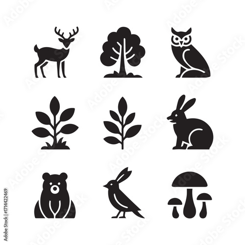 Collection of forest animal and nature icons including a deer, tree, owl, plant, rabbit, bear, bird, and mushroom isolated on white background technology background