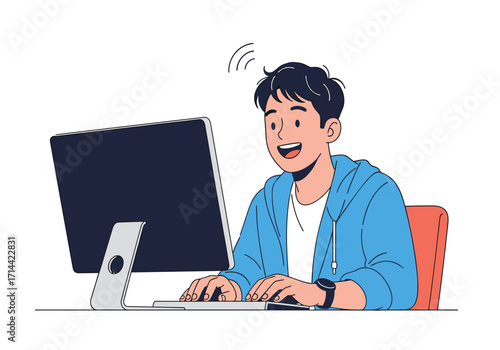 Young boy happily playing computer games at home.