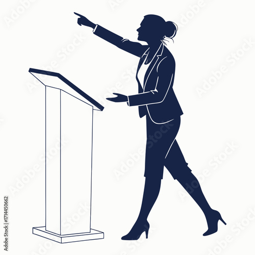 Silhouette of a confident businesswoman in a suit standing at a podium gesturing and pointing upwards while addressing an audience during a presentation or speech
