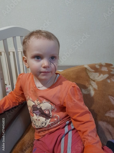 little boy in a bed