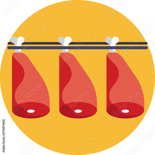 Hams suspended for curing or display in a butcher shop.