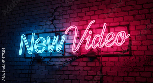 new video neon sign glowing on a brick wall