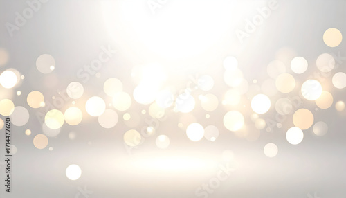 Elegant silver background with glowing golden bokeh lights