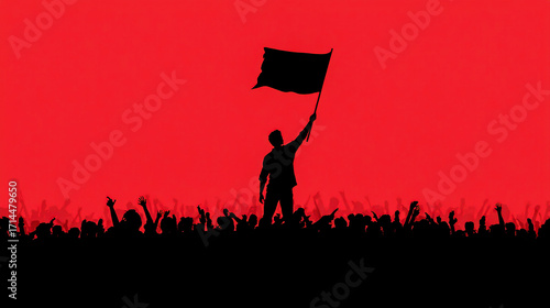 A silhouette of an individual holding up a black flag with their hand