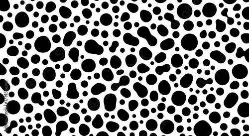 A seamless vector texture of a porous material, like organic foam, bubbles, or cells under a microscope. This abstract black and white pattern is perfect for scientific, modern, or natural designs.