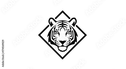 A striking black and white illustration of a tiger's face within a diamond shape.
