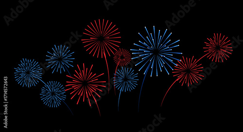 Celebratory red and blue fireworks display on black background