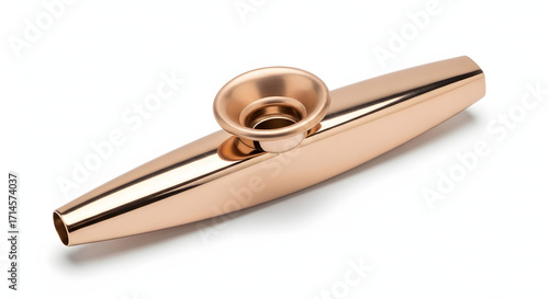 Elegant Kazoo: An elegant, polished kazoo sits in isolated perfection, its form and contours captured in this pristine photograph.