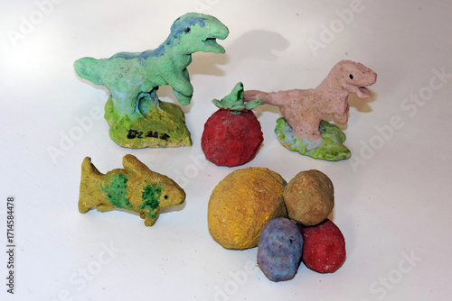 Wallpaper Mural A set of colourful painted clay figurines carved by a child Torontodigital.ca