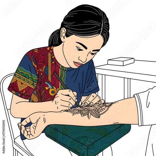 A young woman with dark hair in a ponytail, wearing a colorful patterned shirt, applies intricate henna designs to a person's arm.