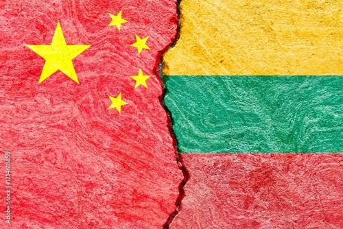 China and Lithuania flags on cracked background. Abstract international politics economy relationship conflicts concept