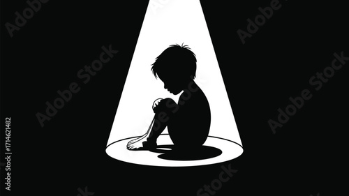Vulnerable child silhouette sits alone in spotlight, conveying feelings of sadness, fear, and isolation