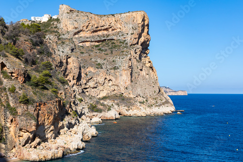 Rocky cliffs at Cala La Granadella on Mediterranean sea, Javea, Costa Blanca, Alicante Province, Spain