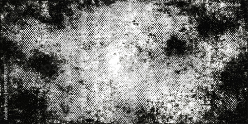 
A vintage gray paper texture is framed by a rough, aged concrete wall, creating a grungy backdrop with a dirty, old pattern
