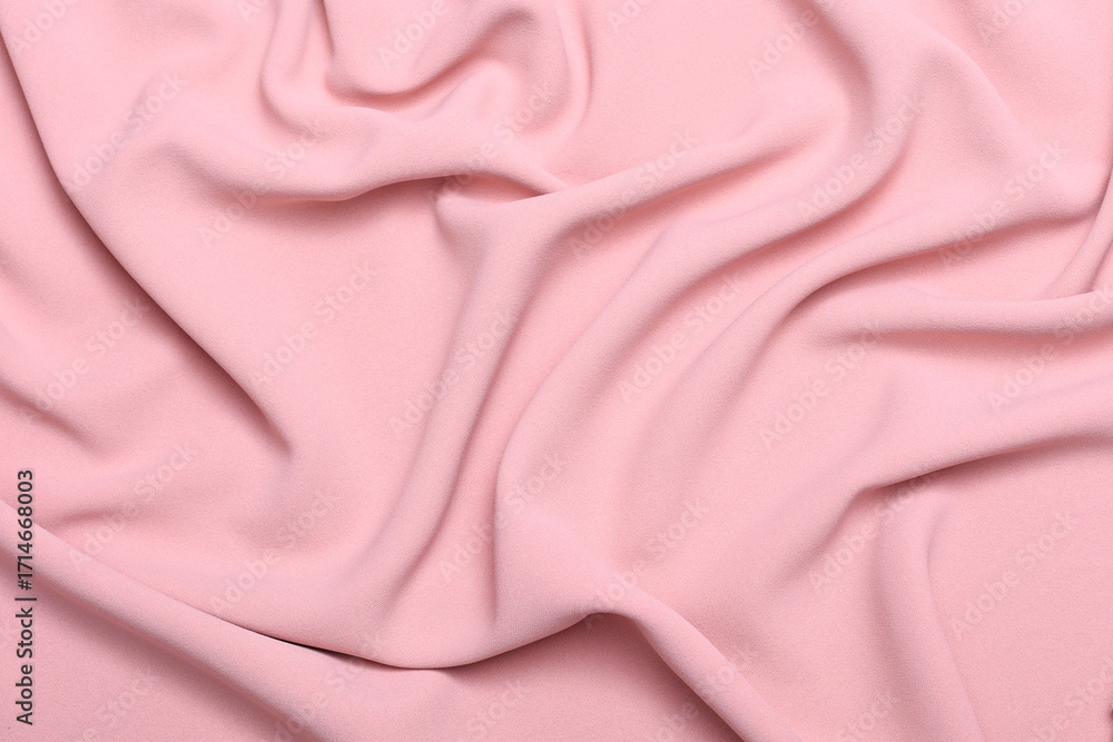 Obraz premium Soft lightweight flowy georgette fabric in pastel pink, elegantly draped with natural folds. Perfect for fashion design, textiles, sewing, dressmaking, and delicate feminine style concepts.