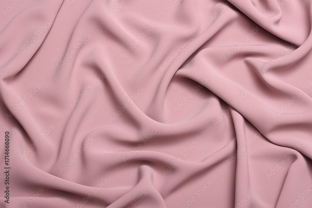 Fototapeta premium Soft lightweight flowy georgette fabric in powder pink, elegantly draped with natural folds. Perfect for fashion design, textiles, sewing, dressmaking, and delicate feminine style concepts.