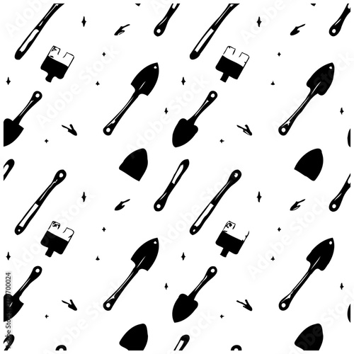 Monochrome garden tools create a captivating and stylized pattern for creative projects for