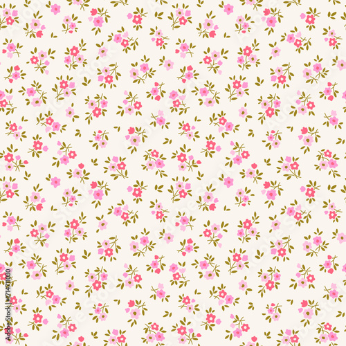 Vector seamless pattern. Cute pattern in small daisy flowers. Small red and pink flowers. Beige cream background. Ditsy floral background. Hand drawn template for fashion textile prints. Stock pattern