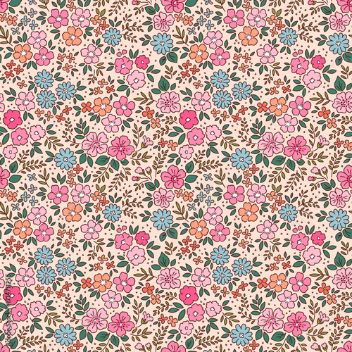 Vintage floral background. Seamless vector pattern for design and fashion prints. Flowers pattern with small pink, orange and blue flowers on a light beige background. Cute Ditsy baby style. Stock art