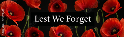 Lest We Forget. Remembrance Day banner with red poppies on a black background.