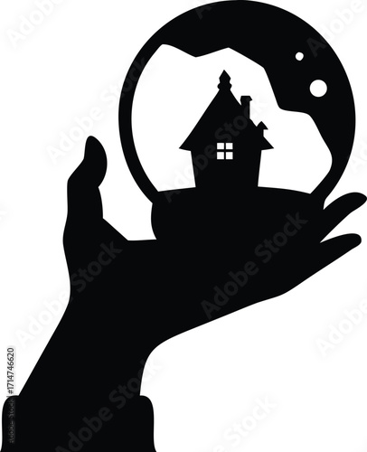 Silhouette of a hand holding a crystal ball with a haunted house inside